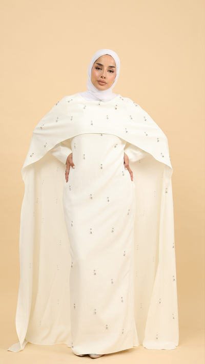 white cape dress with sleeves
