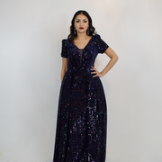 long navy sequin dress with trail